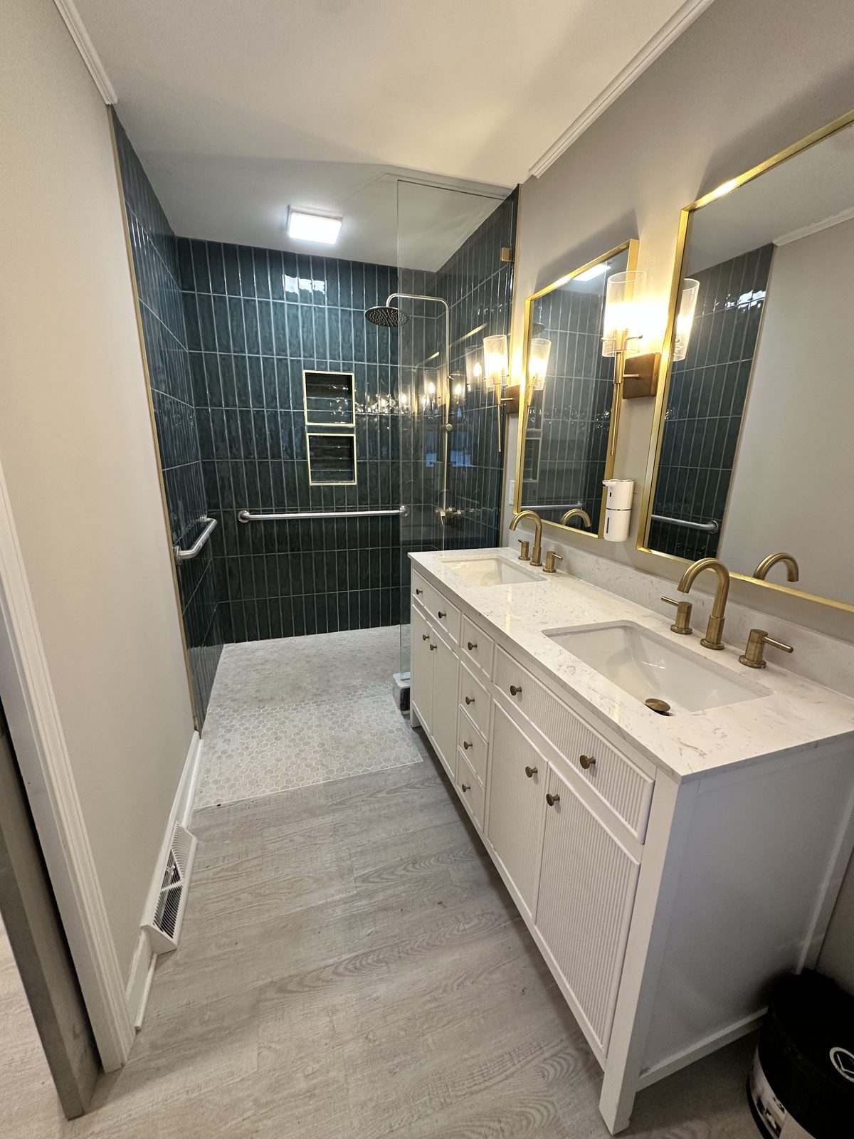 M22 Construction aging-in-place bathroom in Charlotte with curbless tiled walk-in shower and grab bar